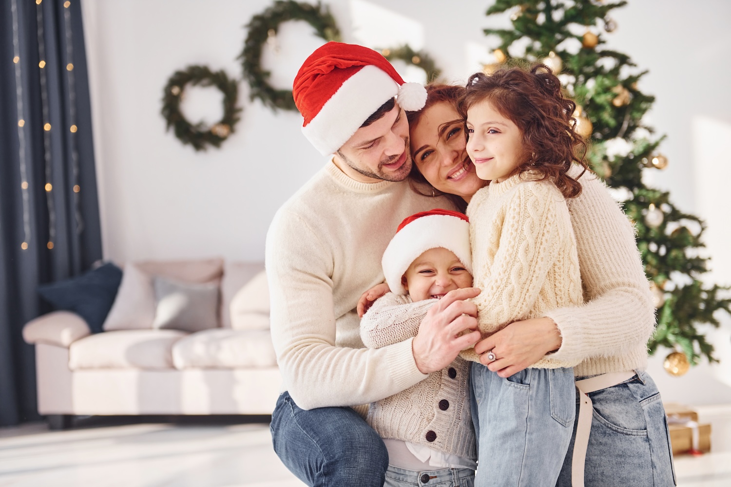 family in christmas hats with holidays loans for bad credit