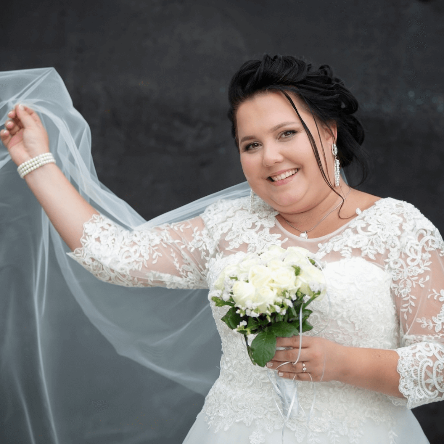 Jasmine wearing a wedding dress