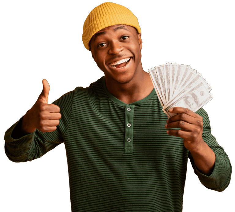 A black man holding dollars and smiling with a thumbs up because he got personal loans in kansas